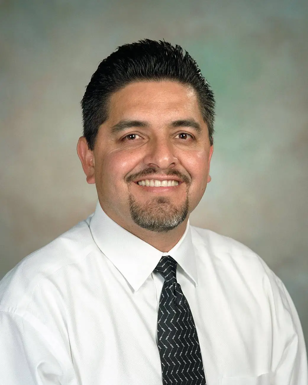 Official NASA portrait of Robert Navarro, project manager/aerospace engineer at NASA Dryden Flight Research Center.